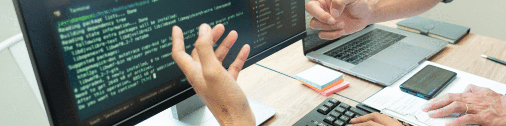 Computer with hands coding linkding background